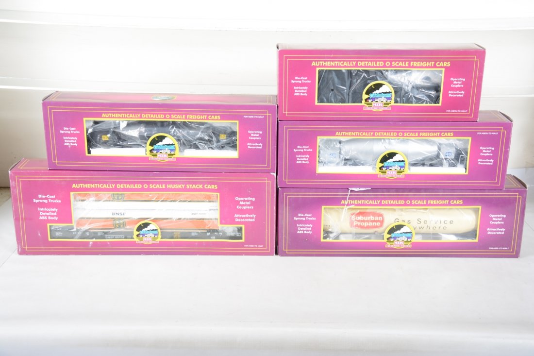 MTH Premier Freight Cars: Includes 20-95005 BNSF husky-Stack; 20-98201 hot metal car; 20-96006 Suburban 33,000 gal. tank car; 20-98202 hot metal car; 20-98206 PRR Jordan spreader. All appear mint with boxes, C10