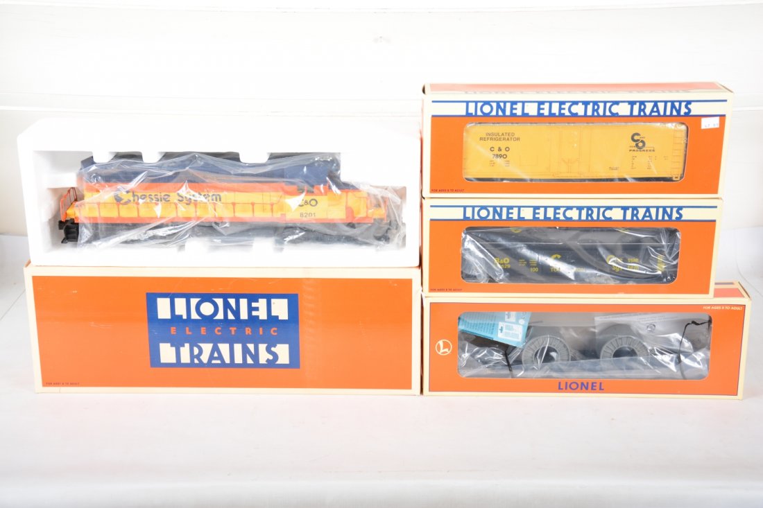 Lionel Chessie Diesel Freight Set: Includes a SD-40 diesel with dual motors and horn; 17403 coil car; 17303 reefer; 16946 F9 well car. All appear new in boxes, C10