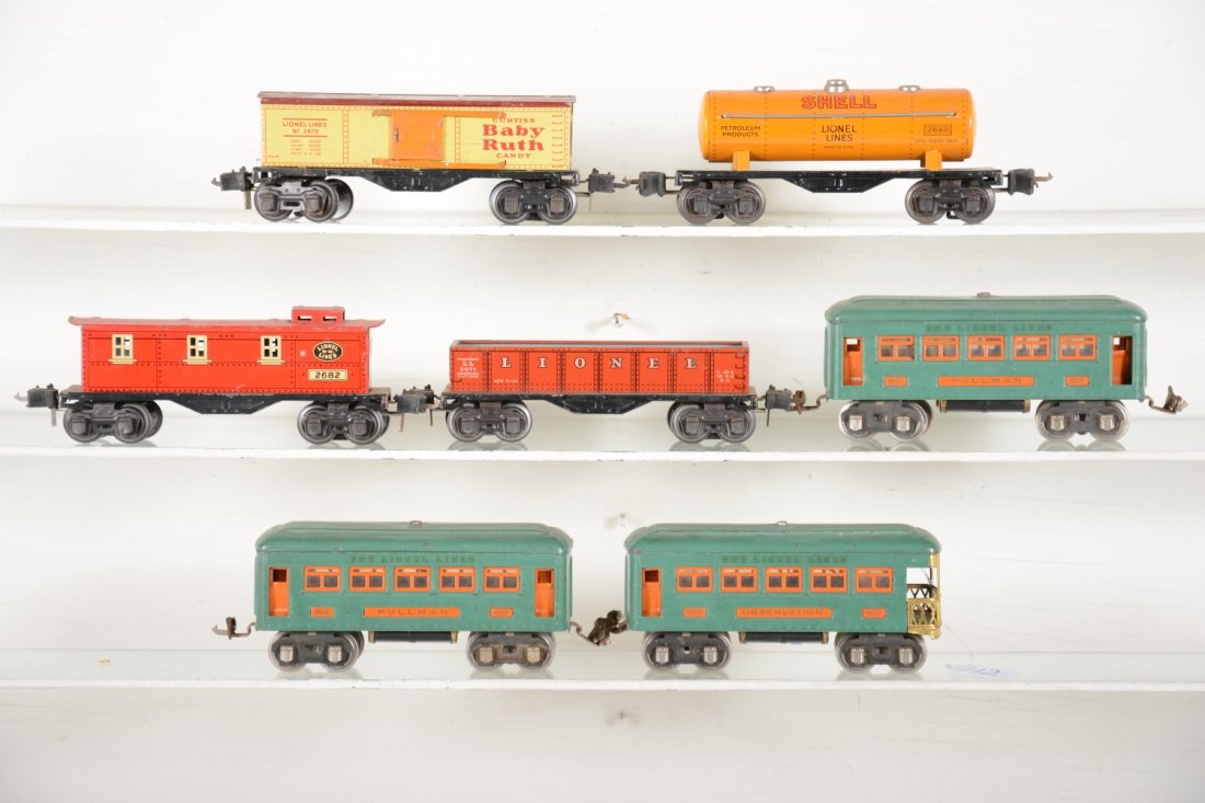 Lionel Freight & Passenger Cars: Includes 2 #607 Pullmans; matching 608 observation; 2677 gondola; 2679 boxcar; 2680 Shell tank; 2682 caboose. All show light to moderate playwear, C6+-7+