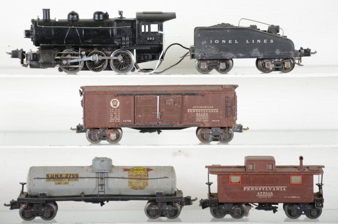Lionel 203 Steam Freight Set: Includes a 203 0-6-0 switcher, missing 1 running light; 2203T slant back tender with light, some corrosion spots, bright lettering; 2758 PRR boxcar, some rust on trucks; 2755 SUNX tank car, wave to fr