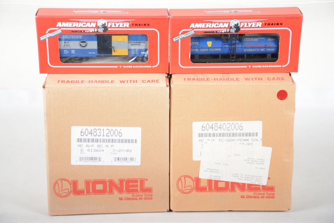 2 Cases Lionel American Flyer Freight Cars: S Gauge. Includes 6 #48312 MP boxcars; 6 #48402 PENN Salt tank cars, all mint factory fresh with boxes and case boxes, C10