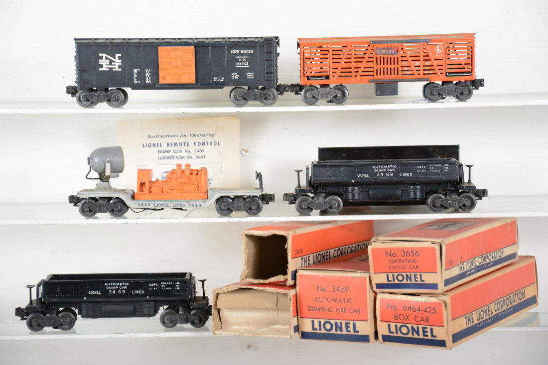 Boxed Lionel Freight Cars: Includes 6520 searchlight with instructions; 3469 coal dump with bin & instructions; 3656 stock car with Armor decal; 6464-425 NH boxcar type IIB; 3469X coal dump with instructions. All show light pla