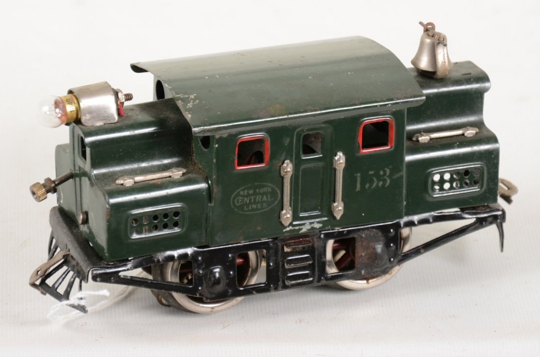Clean Lionel 153 Electric Locomotive: Shiny with nice lettering. It shows moderate playwear, C6