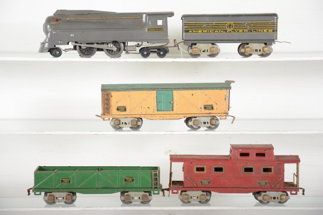 American Flyer Steam Freight Set: Includes a 419 streamline PRR 2-4-4 loco with 418 tender, decals 90%; 3207 sand car; 3208 boxcar; 3211 caboose. All show moderate playwear, C6