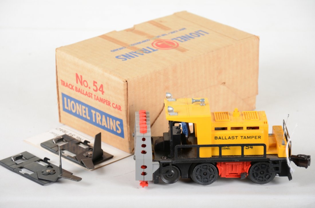 Boxed Lionel 54 Ballast Tamper: Clean motorized unit with both track trips and instructions. It shows light runtime with box, C7+-8