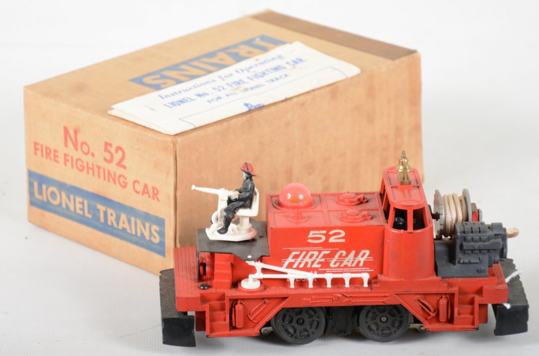 Boxed Lionel 52 Fire Car: Clean with pink bubble light cover. It shows light runtime with instructions and nice box, C7
