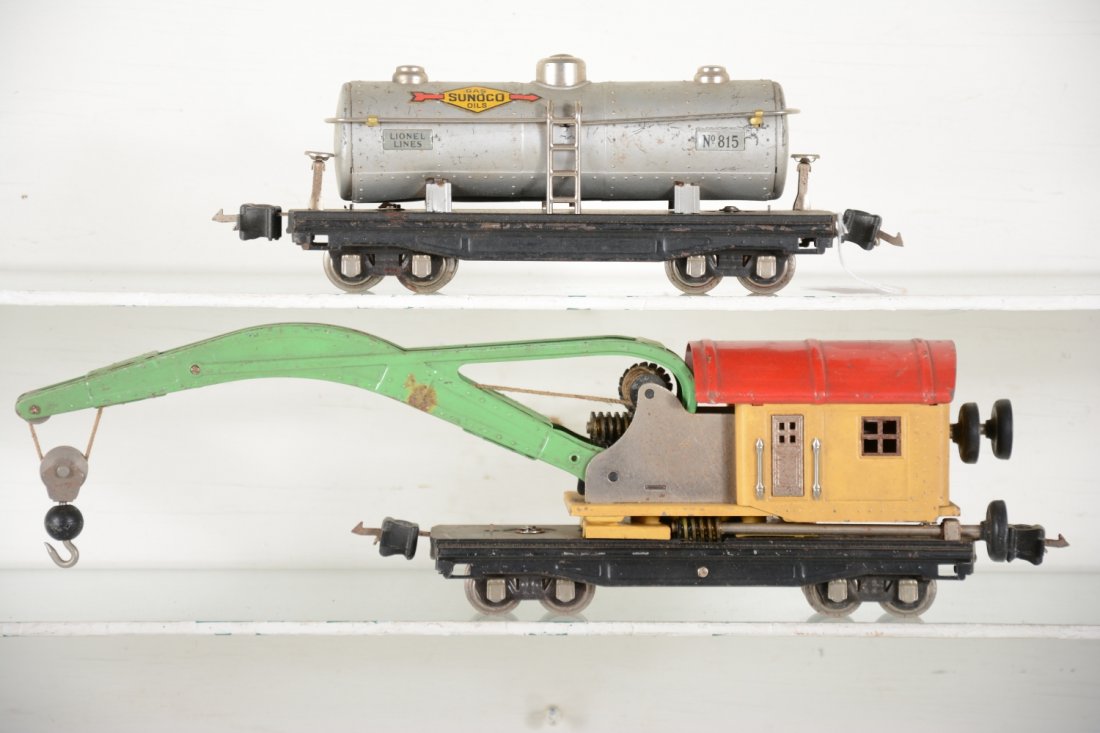 Lionel 810 & 815 Freight Cars: Circa 1935. Includes an 810 crane, late colors, some rust one side; 815 Sunoco tank car. They show moderate to heavy playwear, C4-5