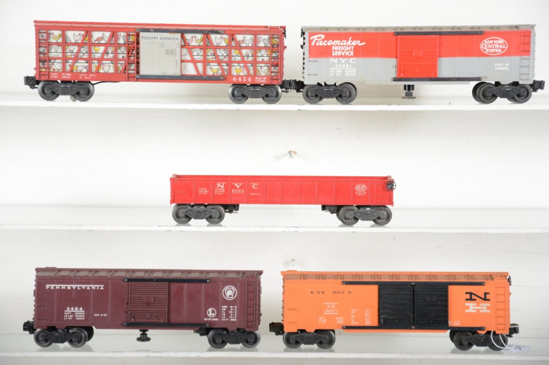 Lionel Freight Cars: Includes 6468-25 NH boxcar; 3494 NYC operating boxcar; 3484 PRR operating boxcar; 6434 poultry dispatch; 6462-125 gondola. All show liught to moderate playwear and would benefit from a cleaning, C6+-7
