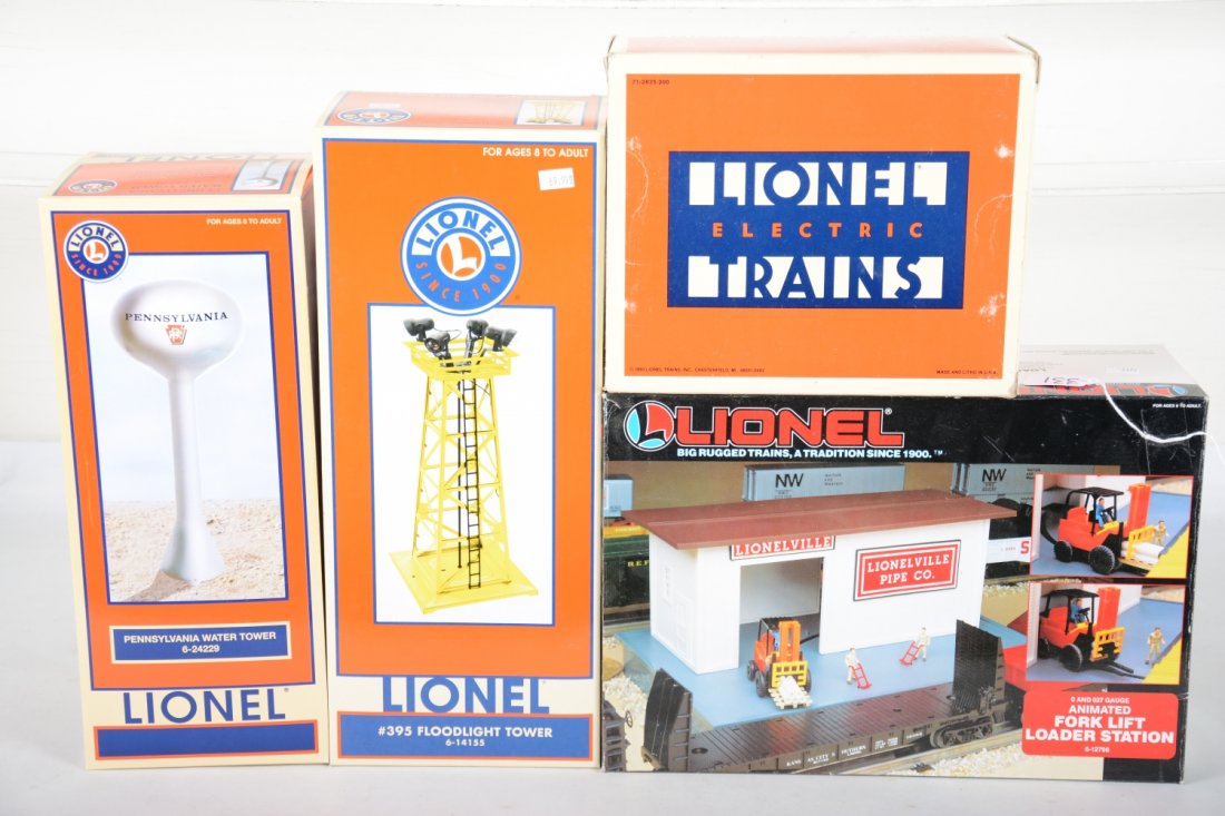 Lionel Accessories: Includes 12798 pipe loader; 12835 fueling station; 14155 floodlight tower; 24229 PRR water tank. All show very light handling with boxes and peripherals & boxes, C9