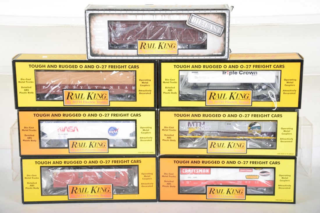MTH RailKing Freight Cars: Includes 30-7609 NS flat with trailer; 30-75144 NASA coal hopper; 30-7209 PRR gondola with crates; 30-7423 MTH Club boxcar; 30-8701 diecast C&O stock car; 7705L NPR caboose; 33-7408 Craftsman boxcar. 