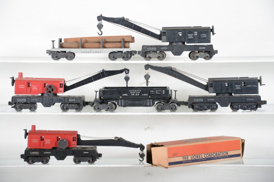 Lionel Freight Cars: Includes a boxed 6411 flat with logs; 2 #6460 crane cars, 1 has 6560 cab; 6560 crane; 2460 crane; 3469 coal dump, C5. Rest show light to moderate playwear, C7