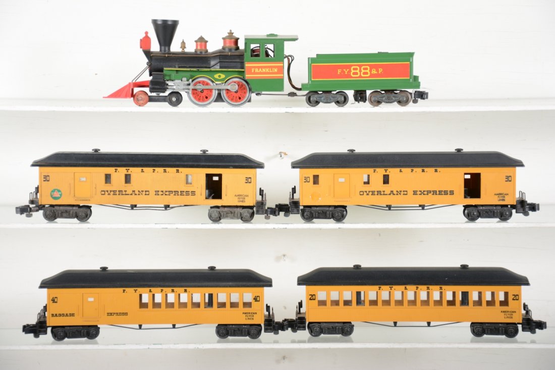 American Flyer Franklin Train Set: S Gauge. Includes a 23088 Franklin steam loco & tender, cab decal missing 1 side; 2 #27030 baggage cars, 1 missing 1 sticker; 27040 combine, missing stack; 27020 coach. Otherwise all show light to mod