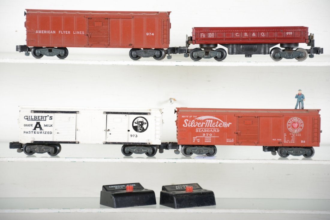 American Flyer Operating Cars: S Gauge. Includes 974 action boxcar, no load with controller; 919 coal dump car; 919 milk car with controller; 970 SilverMeteor walking brakeman car. All show light playwear, C7-7+