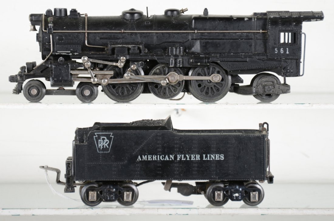 Scarce American Flyer 561 Pacific With Choo-Choo: Circa 1940. 561 PRR K-4 loco with nice lettering & bright rods. It has the scarce 568-C cast PRR tender with Choo-Choo. It shows light playwear, C7-7+. Nice example.