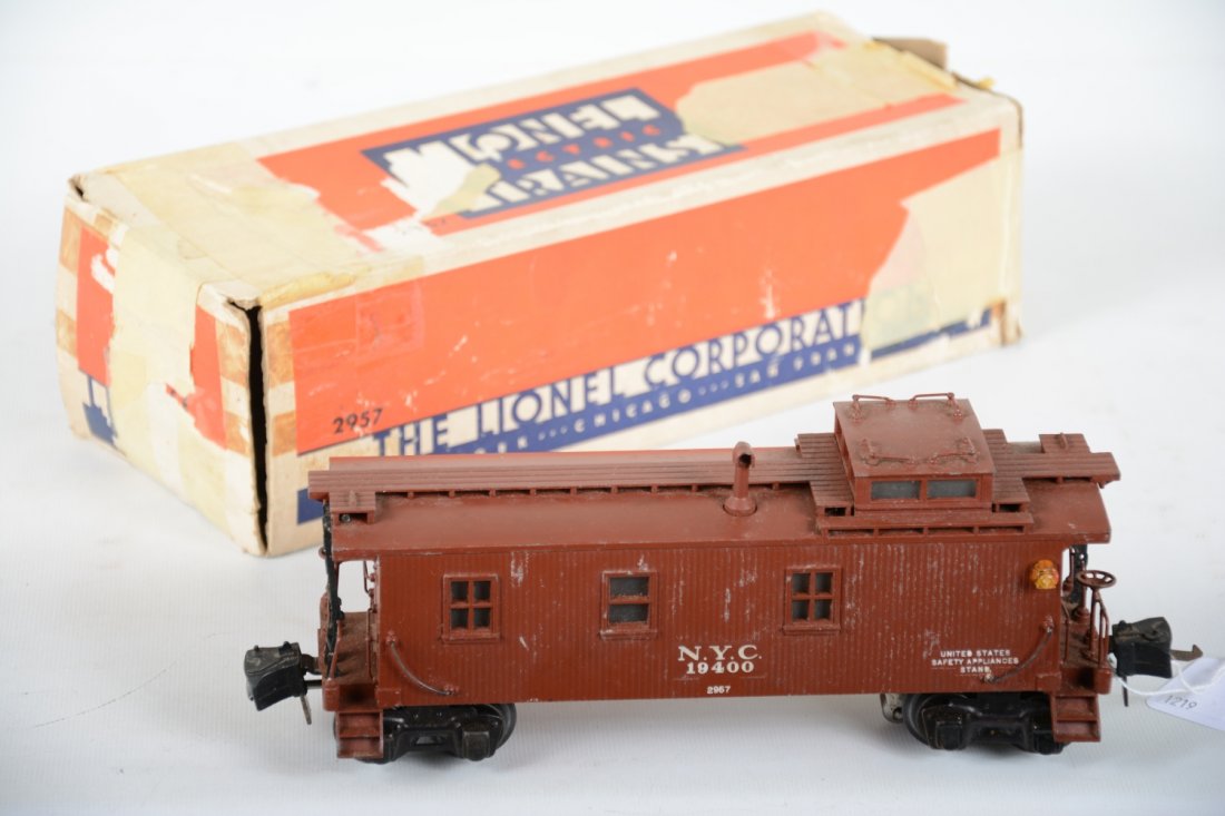 Boxed Lionel 2957 NYC Semi-Scale Caboose: Circa 1940. Straight castings with high couplers. It shows moderate playwear with worn box, C6
