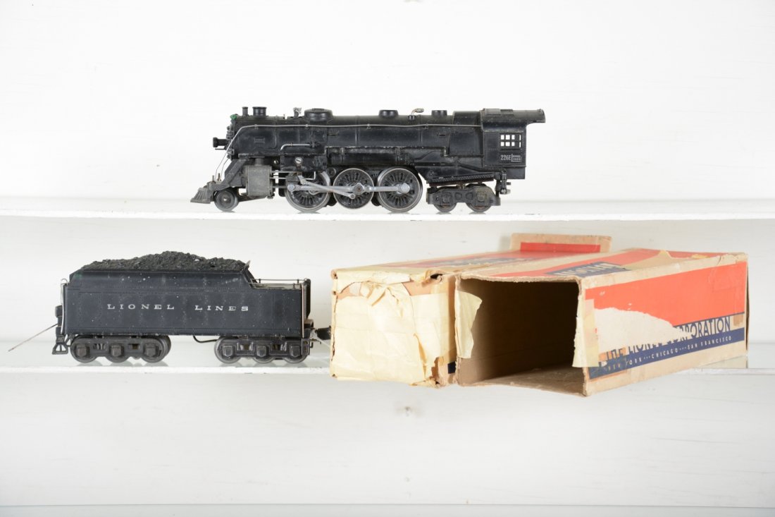 Boxed Lionel 226E Steam Locomotive: Circa 1941. Clean boiler with replaced boiler front hatch; Tougher 2226WX cast whistling tender with low couplers(Can pull Madison cars). Otherwise, they show light to moderate playwear with rough box