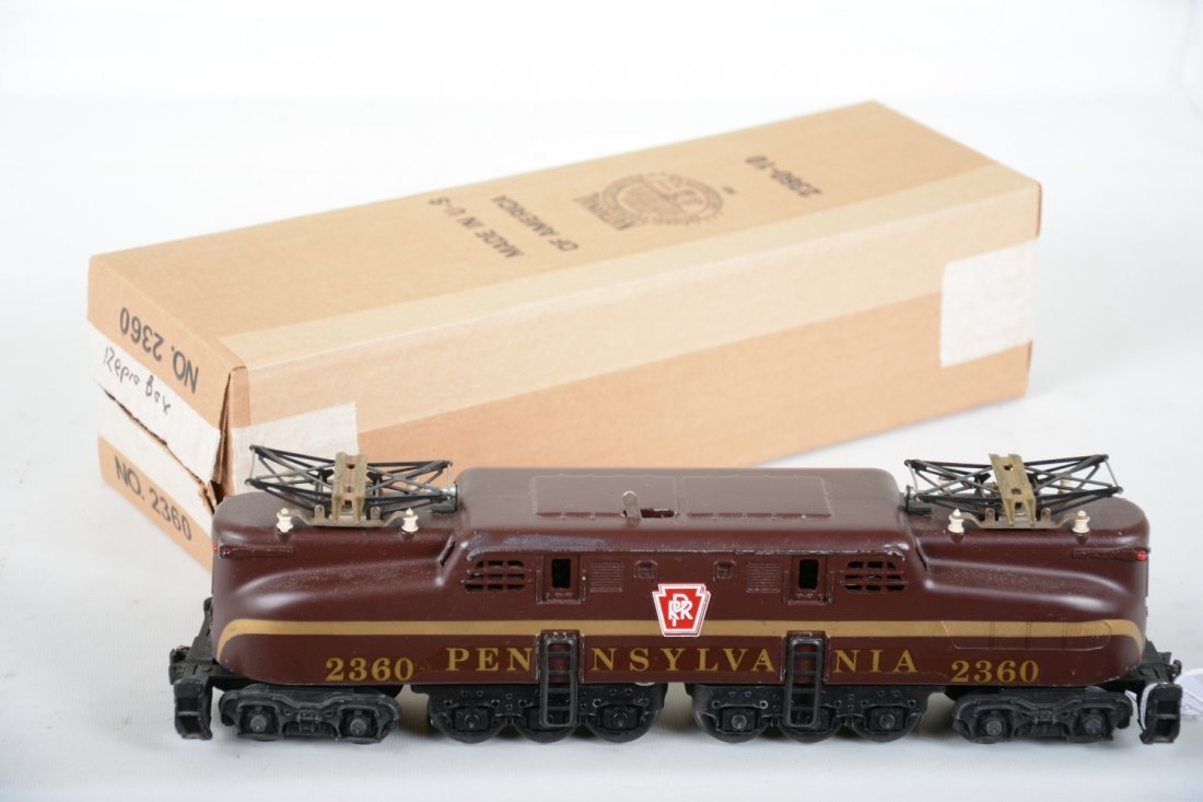 Clean Late Lionel 2360 GG1: Last variation with decals. It is clean with nice satin patina and 99% decals intact. It shows light to moderate playwear with repro box, C7-7+ (see next lot for Presidential cars)