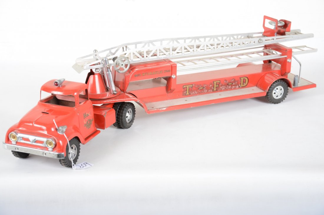 1950s Tonka Areal Fire Ladder Truck: Clean and complete with some oxidation behind decals as usual. It shows light to moderate playwear, C7