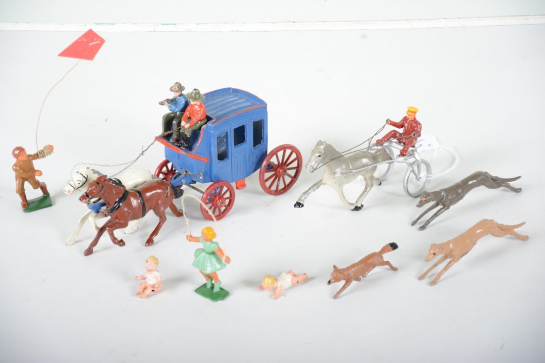 Unusual Figure Group: Includes scarce John Hill greyhound racing dogs with fox; Barclay trotter; 2 john Hill Babies; gray Iron girl skipping rope and box flying a kite; John Hill stage coach, gunner has broken gun. Rest sh