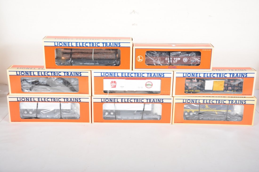 Lionel Freight Cars: Includes 19421 Hirsch vat car; 16922 C&O trailer flat; 2 # 16916 Ford trailer flats; 19539 Heinz reefer; 17408 Cotton belt gondola; 19833 poultry dispatch; 17810 NP log flat. All appear new in boxes, 