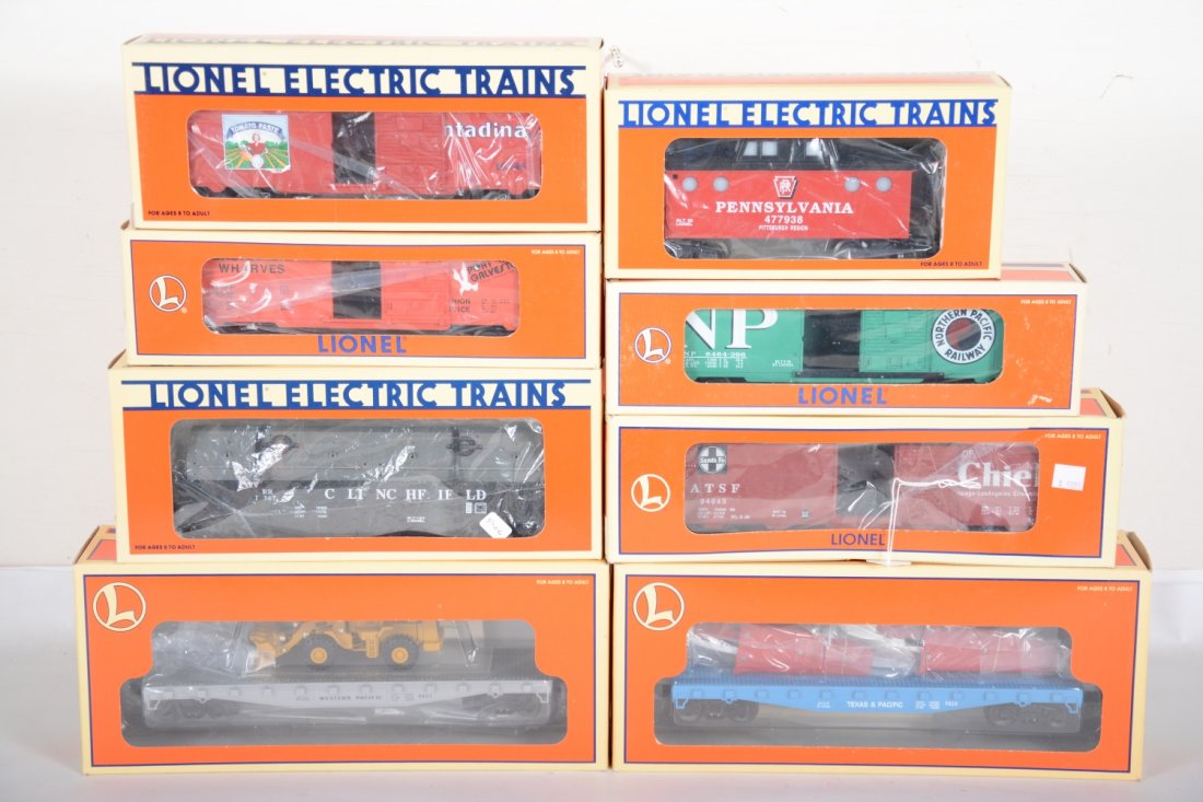 Lionel Freight Cars: Includes 17244 SF boxcar; 19284 NP boxcar; 17516 T&P flat with airplanes; 17517 WP flat with front loader; 16245 Contadina boxcar; 16367 Clinchfield coil car; 19727 PRR caboose; 16284 Galveston Wharve