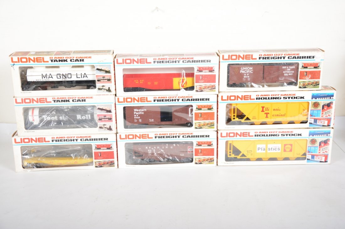 Lionel Freight Cars: Includes 9284 SF gondola; 9419 UP boxcar; 9235 UP derrick; 9324 Tootsie Roll tank car; 6105 Reading operating hopper; 6107 Shell hopper; 6131 IC hopper; 9279 Magnolia tank; 9452 WP boxcar. Most show l
