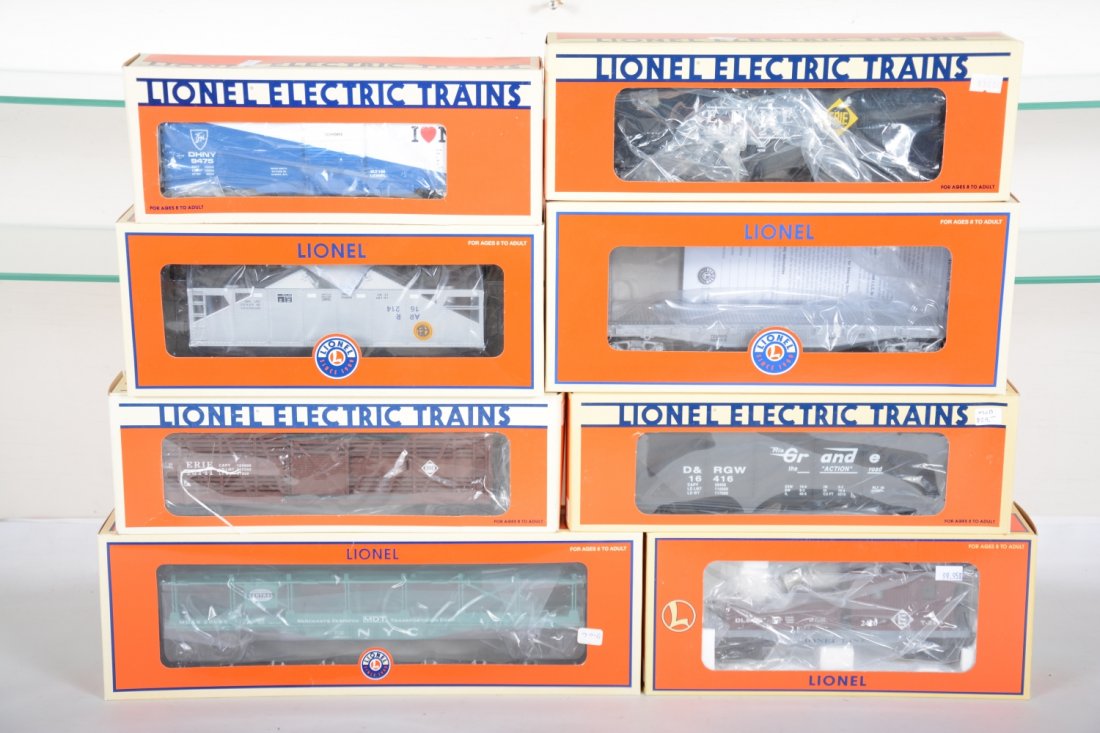 Lionel Freight Cars: Includes 16141 Erie stock car; 19324 Erie hopper; 16487 Alaska hopper; 26085 NYC auto-carrier; 52395 LCCA Frisco flatcar; 19737 Lackawanna searchlight caboose; 16416 D&RGW hopper; 9475 D&H boxcar. All