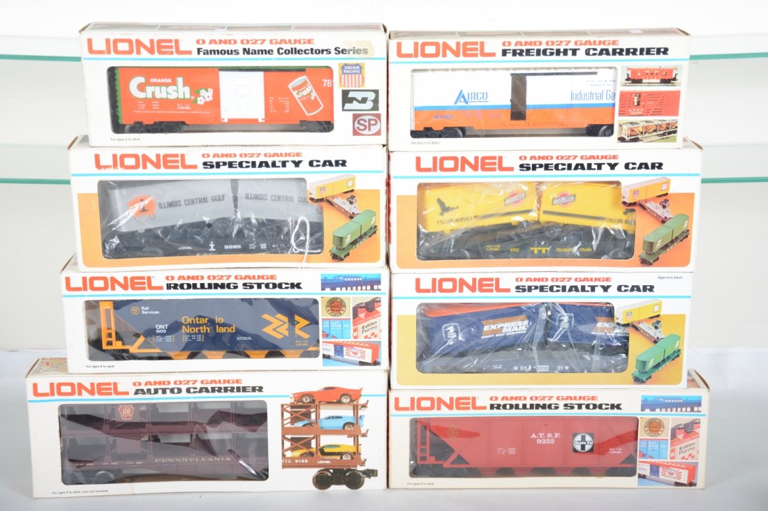 Lionel Freight Cars: Includes 9733 Airco boxcar; 9285 IC Gulf piggy-back car; 9322 SF hopper; 9351 PRR auto-carrier; 6100 ON hopper; 6531 Express mail van flat; 7810 Orange Crush boxcar; 9352 CN&W piggy-back flat. Some sh
