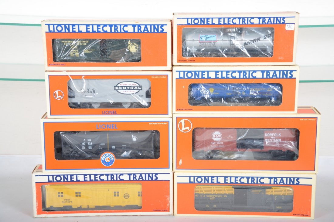 Lionel Freight Cars: Includes 17009 NYC hopper; 19601 NA tank car; 7404 JC boxcar; 16124 Penn Salt tank; 16491 CNJ hopper; 26241 N&W boxcar; 5724 PRR bunk car; 16121 C&NW stock car. All appear new in boxes, C10
