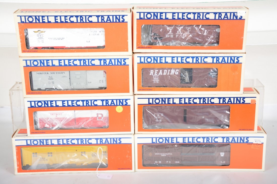 Lionel Freight Cars: Includes 9240 NYC operating hopper; 9223 Reading operating boxcar; 9472 D&M boxcar; 9482 NS boxcar; 9483 Manufacturers RRY boxcar; 19510 PRR stock car; 5731 L&N reefer; 5724 PRR bunk car. All appear n
