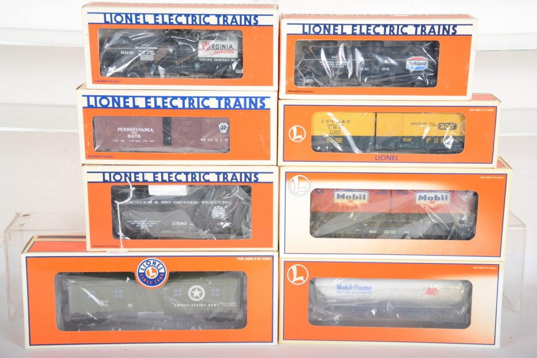 Lionel Freight Cars: Includes 19678 US Army smoking bunk car; 19471 Mobile flat with trailers; 17873 Ashland tank car; 19472 Mobile flat with tank; 9476 PRR boxcar; 6323 Virginian tank car; 17880 LCCA DRGW caboose; 52110 