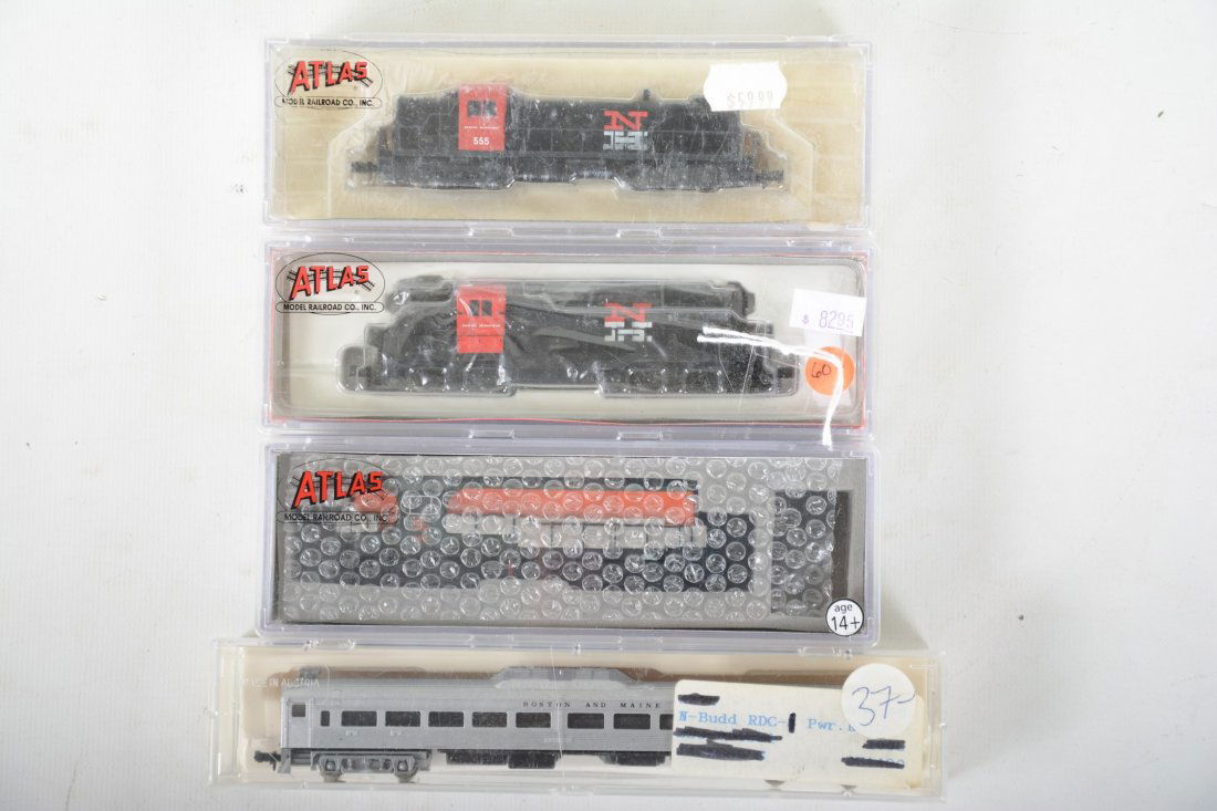 4 N Ga Diesels: Includes an unmarked B&M RDC-1 Budd car, lightly run with box, C8+; Atlas 52179 H16-44 #598 test run; 48325 NH GP-9 diesel no cab number; 42008 Alco RS-3 #555. Rest new in boxes, C10