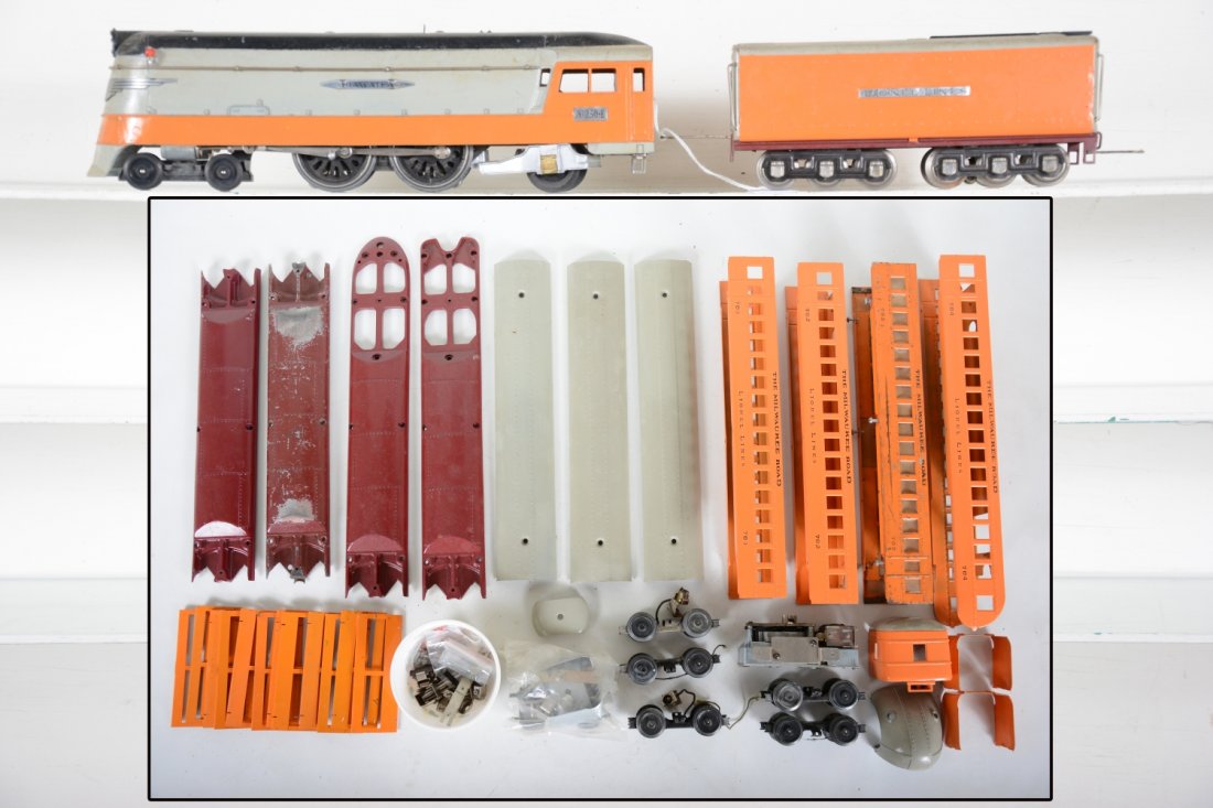 Lionel 755W Hiawatha Set Project: Consignor never quite finished this project. He painted everything and assembled the loco & tender, minus whistle installation. All the rest appears painted and unassembled. We cannot guarantee all th