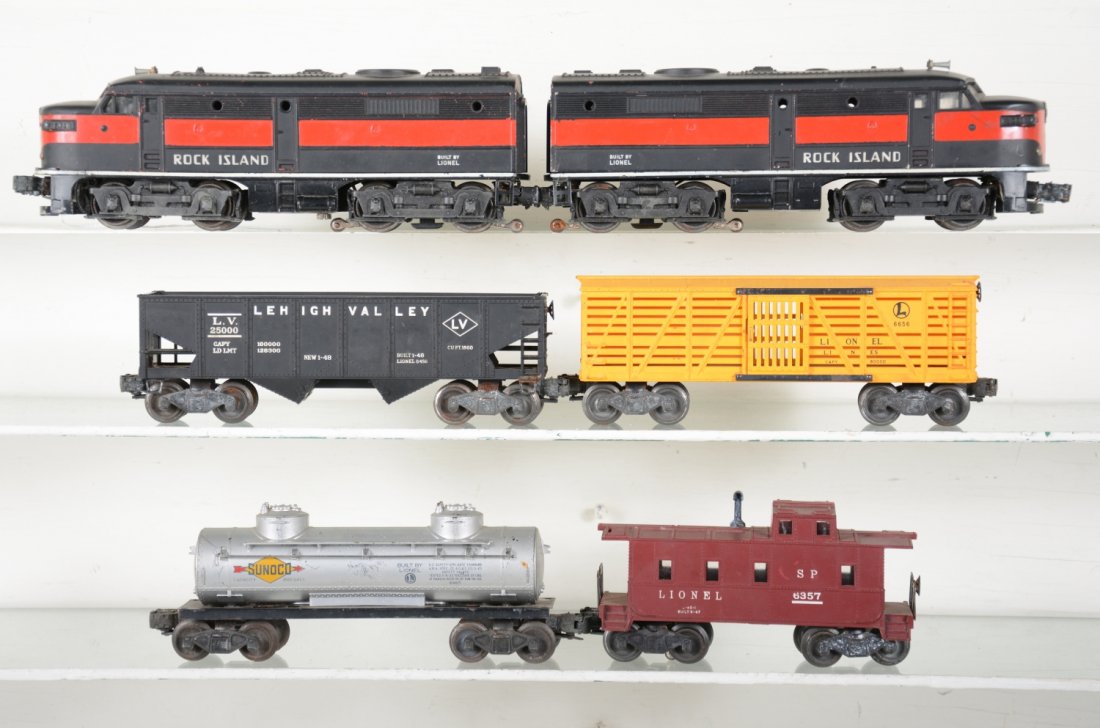 Lionel 2031 RI Diesel Set: Clean matching shells with nice frames, bright lettering; battery damage on bracket inside; 6566 stock car; 6456 LV hopper; 6465 tank car; 6257 caboose. Rest show light to moderate playwear, C7-7+
