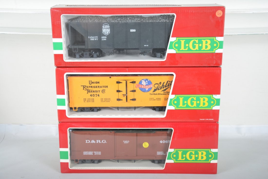 3 LGB American Freight Cars: G Gauge. Includes 4067 DRGW boxcar; 4074 Z02 Schlitz Beer reefer; 4076 EBT hopper. Most appear new in boxes, C9-10