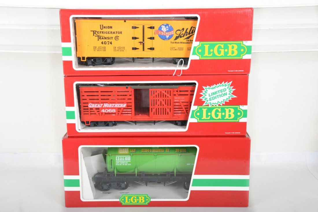 3 LGB American Freight Cars: G Gauge. Includes 4074 Z02 Schlitz Beer reefer; 4080 Y05 SD&A tank car; 4068 N01 GN stock car. Most appear new in boxes, C9-10