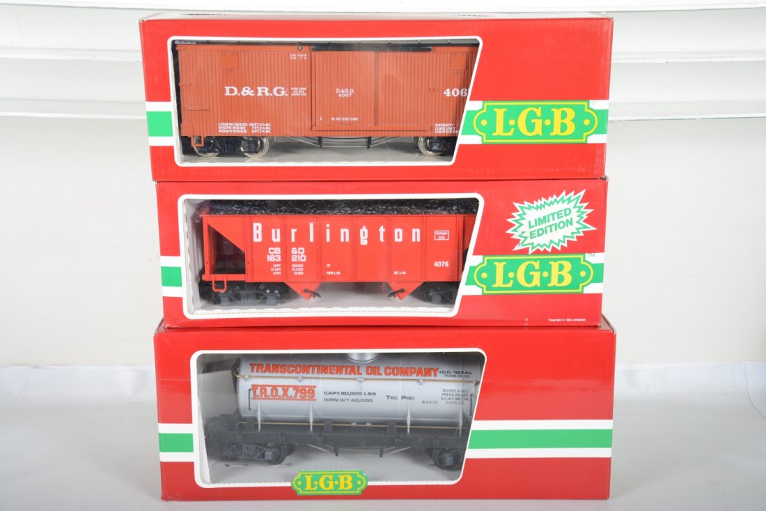 3 LGB Freight Cars: G Gauge. Includes 4080 Yo1 LROX tank car; 4076 M01 Burlington hopper, ob has light water damage; 4067 DRGW boxcar. Most appear new in boxes, C9-10