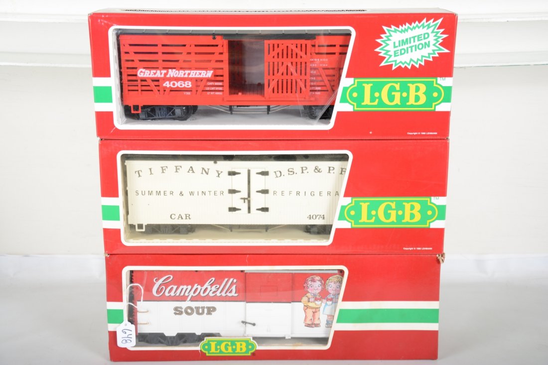 3 LGB American Freight Cars: G Gauge. Includes 41911 Campbell's Soup boxcar; 4068 N01 GN stock car; 4074 B02 Tiffany reefer. Most appear new in boxes, C9-10