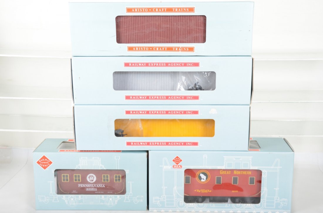 5 Aristo Craft Freight Cars: G Gauge. Includes 41003 MC gondola; 42201 PRR bobber caboose; 46305 PRR flat car; 41002 CP covered gondola; 42101 REA caboose. Most are unrun with boxes, C8-10