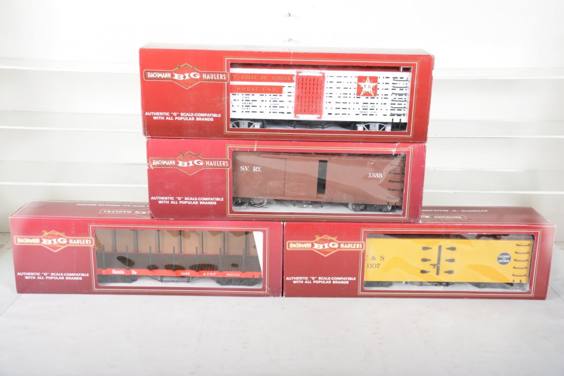4 Bachmann Deluxe Freight Cars: G Gauge. 93224 Southern reefer; 93602 SF flat car; 93323 Sumter boxcar; 98172 Circus stock car with horse. All appear like new in boxes, C9-10