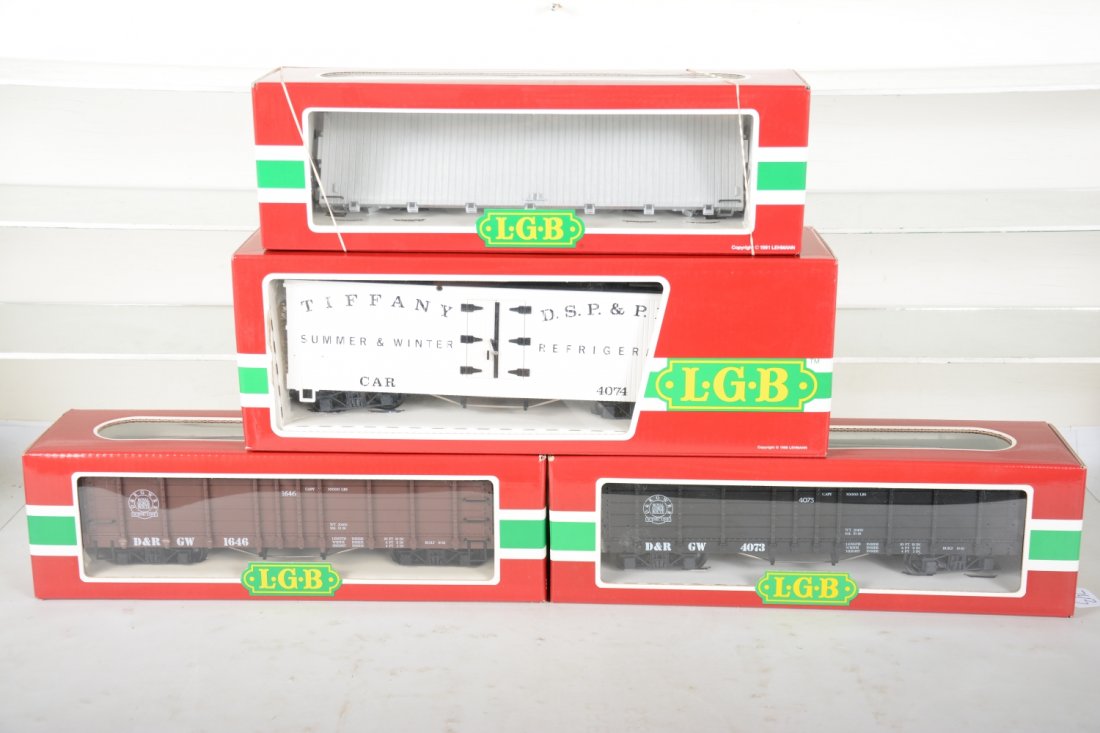 4 LGB Freight Cars: G Gauge. Includes 4073-C03 DRGW gondola; 4360-DG Wilson's Circus flat car; 4073 DRGW gondola; 4074 B02 Tiffany reefer. All appear new in boxes, C10