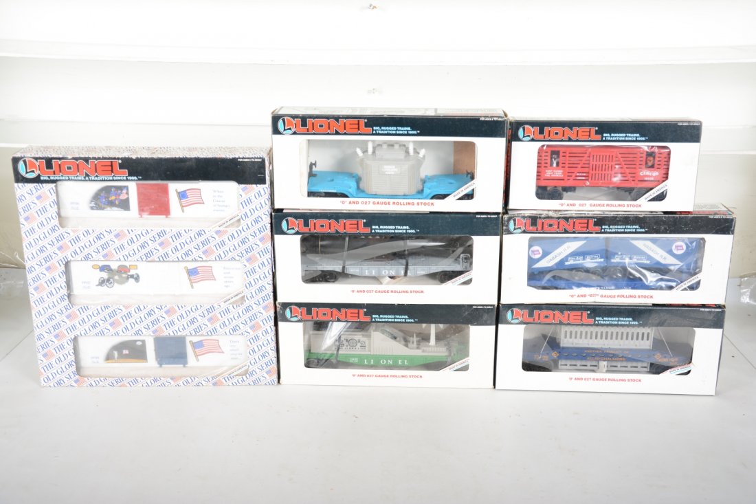 Lionel Freight Cars: Includes 19599 Old glory boxcar 3-pack; 16652 operating radar car; 16351 flat with sub; 16332 flat with transformer; 16349 Allis-Challmers car; 16314 Wabash flat with trailers; 16638 Circus animal car