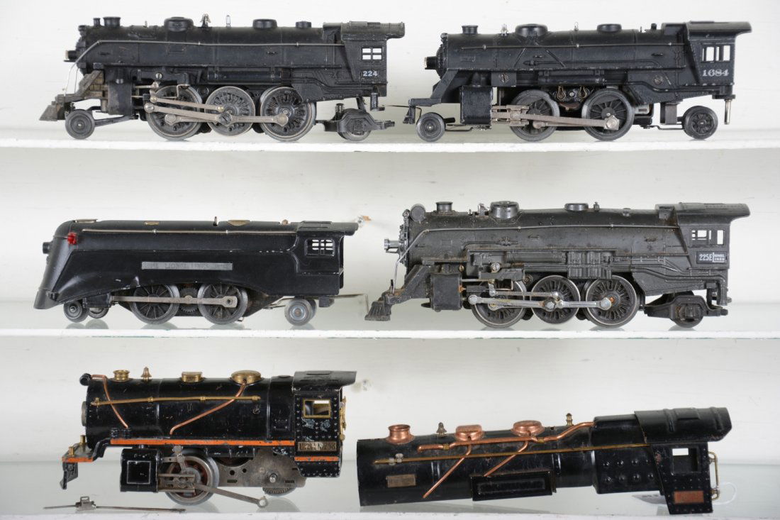 Lionel Steam Locomotive Projects: Includes a 258, intact frame; 1684; 225E gunmetal; 224; 1689 repaint; 260E shell. See photos for condition and contents. Sold AS-IS.