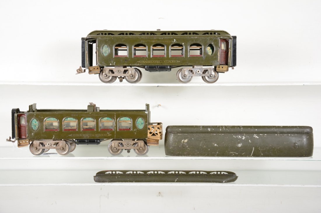 Lionel 18 & 190 Passenger Cars: Standard Gauge. Includes an 18 Pullman missing window material and 1 broken coupler; 1990 observation, roof needs mending. Both are clean & shiny with readable lettering and show moderater playwear, o