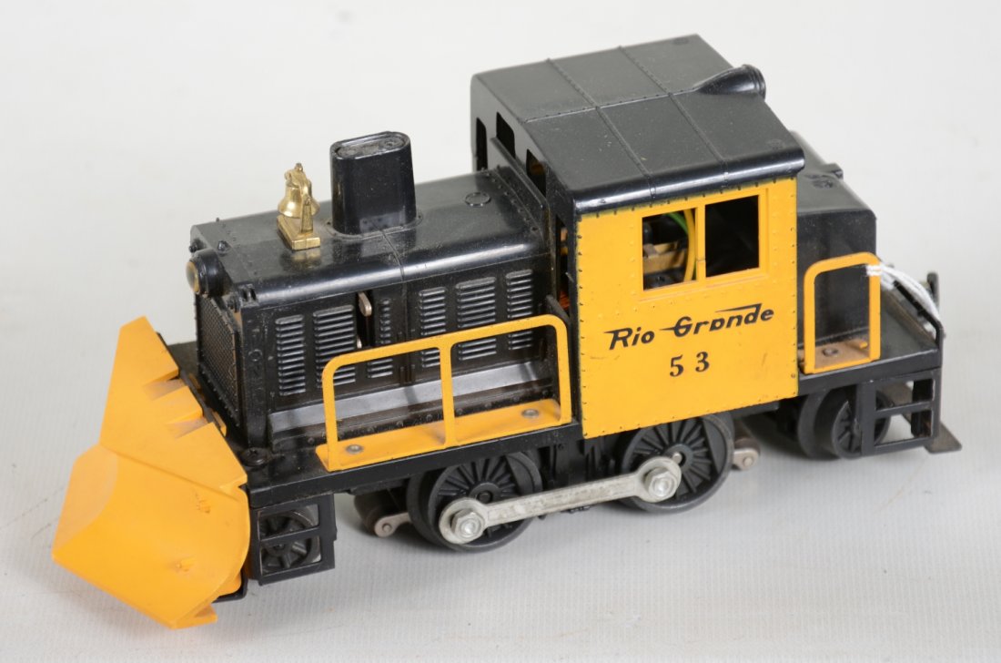 Clean Lionel 53 RG Snow Plow: Nice railings with 1 repaired hairline strut crack. It shows light playwear, appears C7+