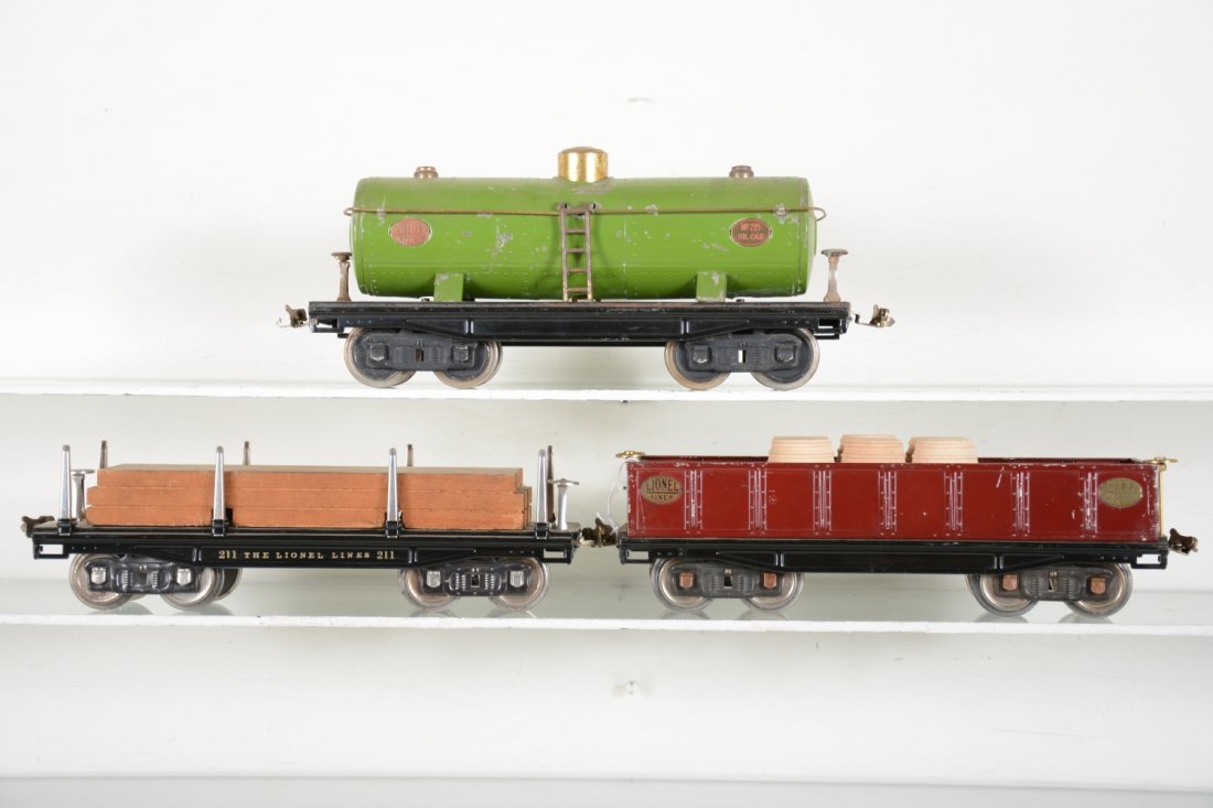 Lionel 215, 212 & 211 Freight Cars: Standard Gauge. Includes a 215 tank car & 212 gondola with repro barrels, C5+-6; restored Lionel 211 lumber car.