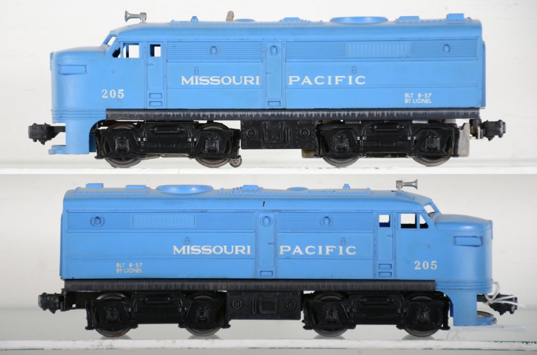 Clean Lionel 205 MP Alco Diesels: Nice matched pair with intact cowls and cowl support installed. They show light to moderate playwear, C7