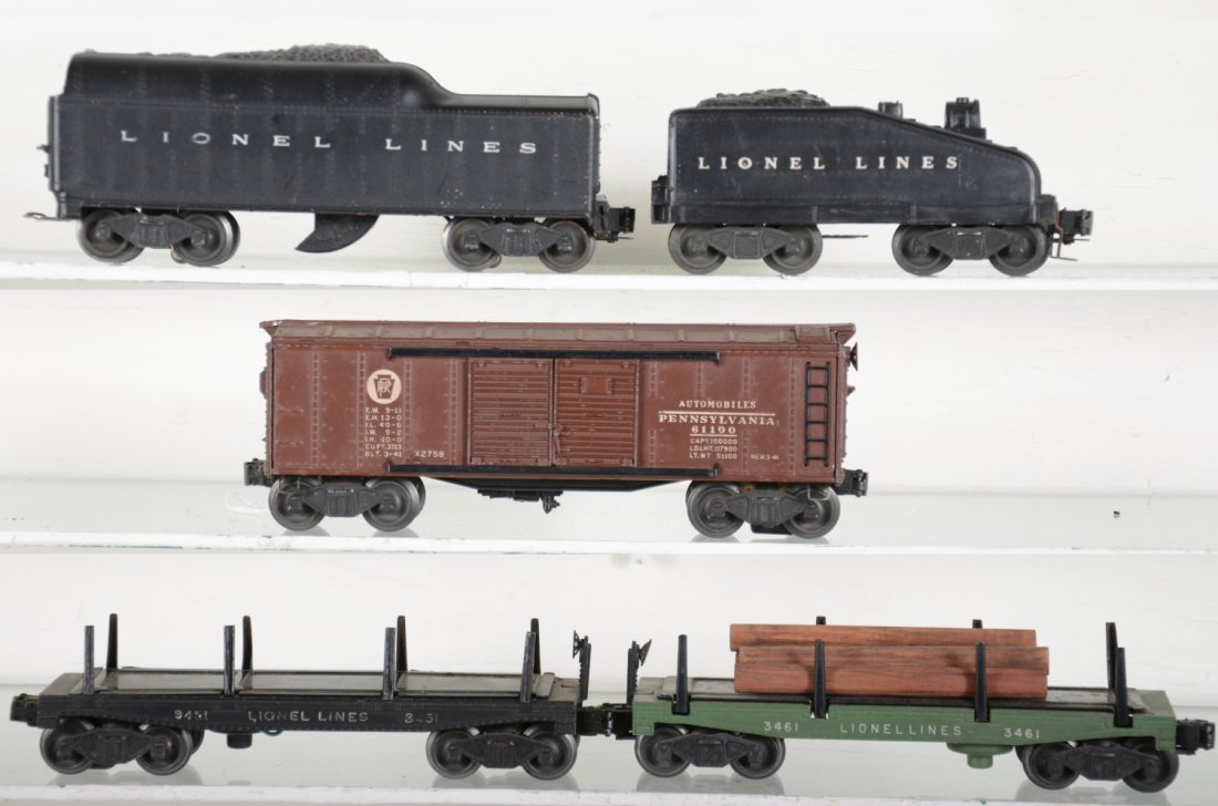 Lionel Lot: Includes 1615T tender; 2046W tender, 1 chipped step; 3451 log dump; 2458 PRR boxcar; 3461-25 log dump. Rest show moderate playwear, C6