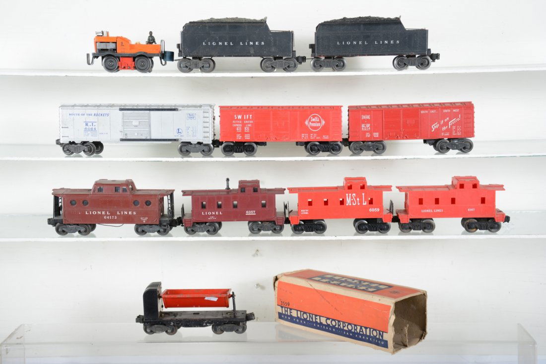 Lionel Freight Cars: Includes 50 gang car, 1 man; 6417 caboose; 6167 caboose; 6014 boxcar; 6059 M&StL caboose; boxed 3559 dump car, C4; 6020W tender; 6466WX tender; 6357 caboose; 6464-175 RI boxcar, type I; 6050 Swift's b