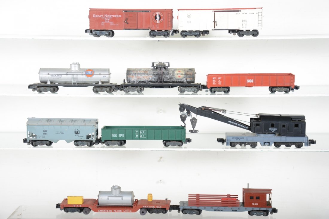 American Flyer 900 Series Freight Cars: S Gauge. Includes 949 track cleaner; 912 Koppers tank, needs cleaning; 941 Frisco gondola; 913 GN boxcar stickers intact; 931 T&P gondola; 924 CRP cement car; 925 Gulf tank; 933 B&O boxcar; 944 crane;
